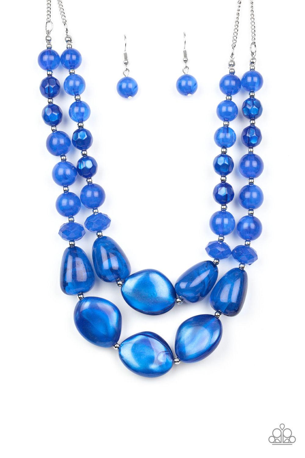 Paparazzi Accessories Beach Glam - Blue Varying in shape and opacity, a refreshing collection of glassy and iridescent Galaxy Blue beads layer below the collar for a boldly colorful look. Features an adjustable clasp closure. Sold as one individual neckla