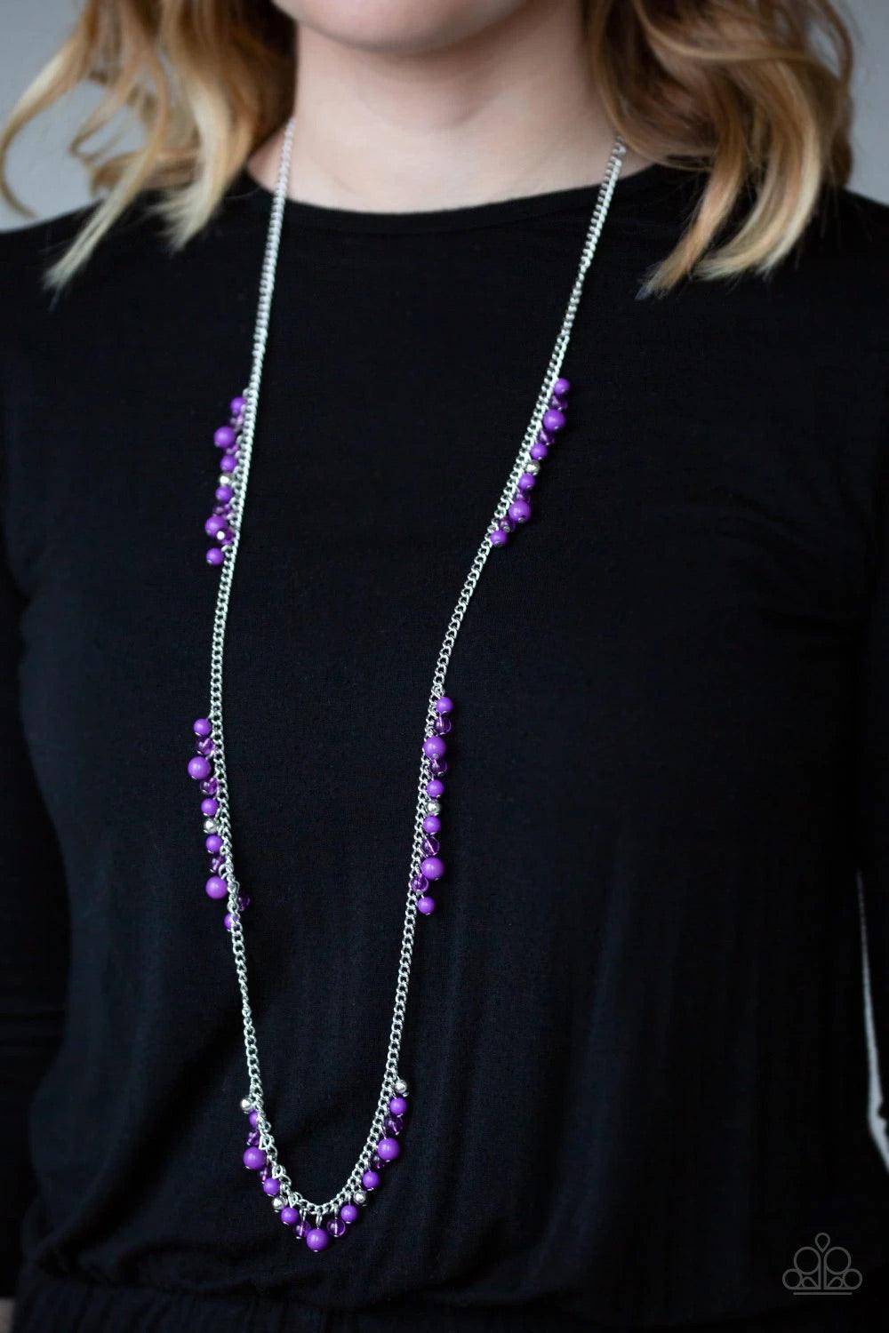 Paparazzi Accessories Miami Mojito - Purple Sections of shiny silver, polished purple, and glassy beads trickle along a shimmery silver chain along the chest for a flirtatious look. Features an adjustable clasp closure. Sold as one individual necklace. In