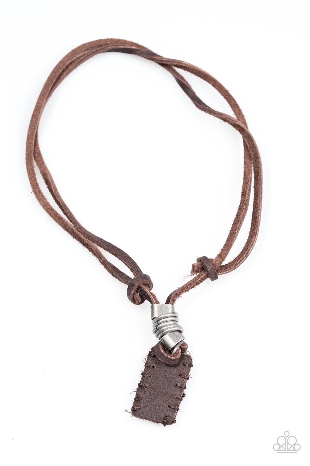 Paparazzi Accessories Alpine Alps - Brown Brushed in an antiqued finish, silver rings and metallic accents slide along knotted leather strands, giving way to a leather pendant for a rustic finish. Features an adjustable sliding knot closure. Jewelry