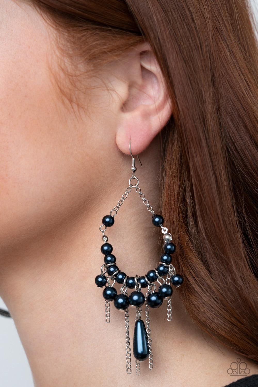 Paparazzi Accessories Party Planner Posh - Blue A fringe of silver chains and classic pearly blue beads swing from the bottom of a matching pearly beaded chandelier-like frame, giving way to an elongated pearly blue teardrop for a vintage inspired eleganc