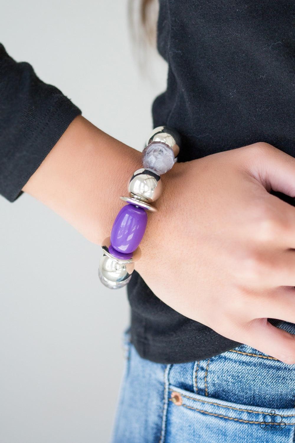 Paparazzi Accessories BAY After BAY - Purple Dramatic silver, vivacious purple, and faceted cloudy beads are threaded along a stretchy elastic band, creating a seasonal look around the wrist. Jewelry
