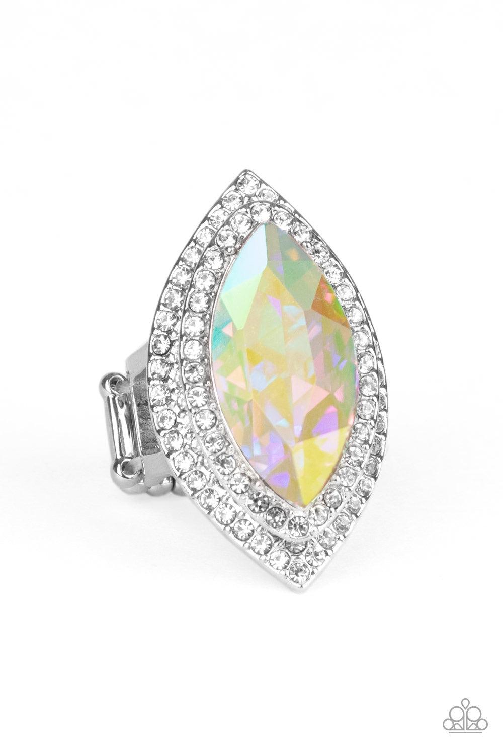 Paparazzi Accessories Jaw-Dropping Dazzle - Multi Featuring an oil spill finish, a dramatic iridescent gem is pressed into the center of stacking silver frames encrusted in row after row of glassy white rhinestones for a blinding look. Features a stretchy