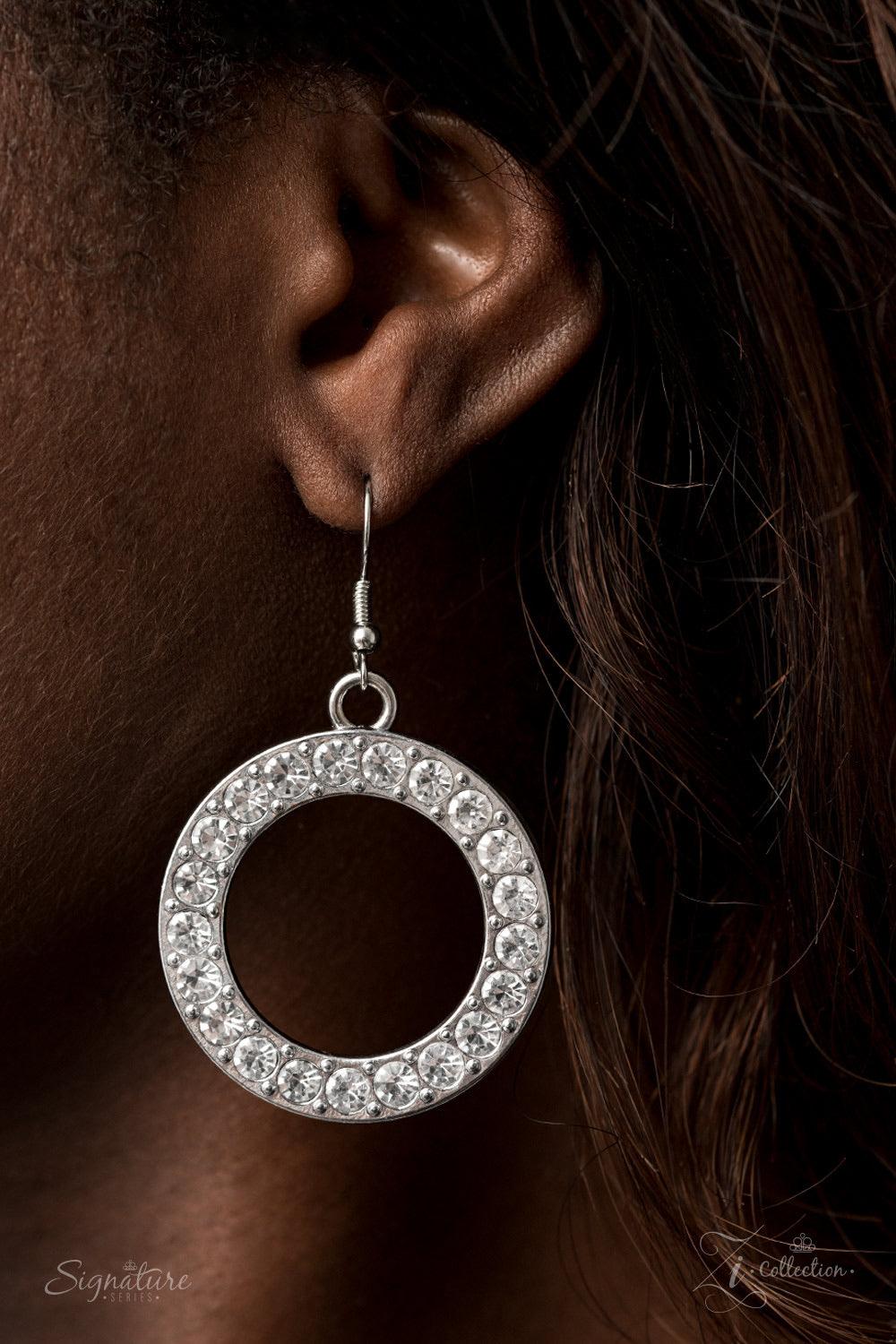 Paparazzi Accessories The Keila 💗💗ZiCollection $25💗💗 Varying in size and shimmer, shiny silver rings and white rhinestone encrusted hoops sporadically link into two bubbly rows below the collar. The flawless frames increase in size at the center for d