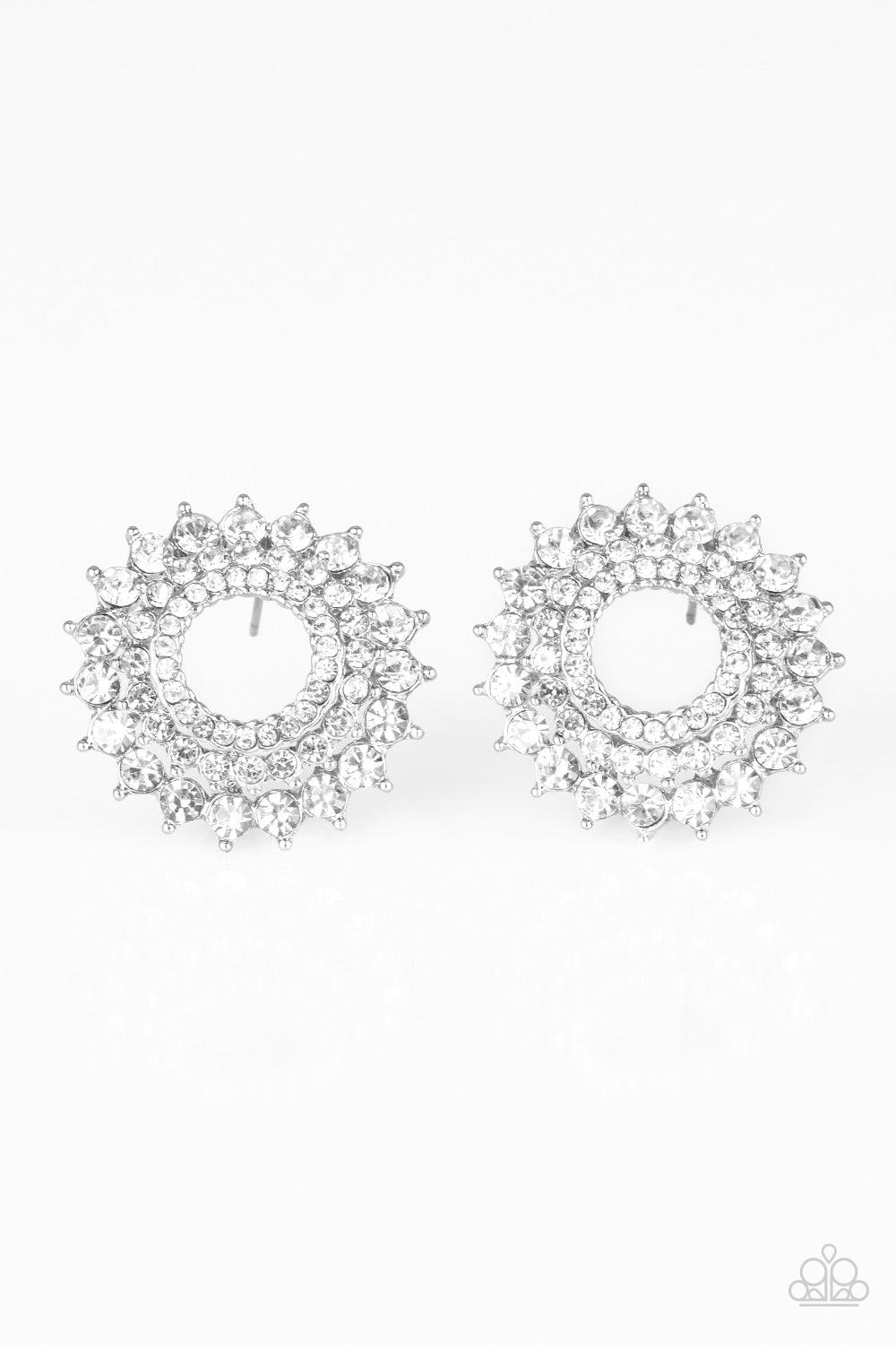 Paparazzi Accessories Buckingham Beauty - White Gradually increasing in size, glassy white rhinestones are encrusted along three stacking silver frames for a regal look. Earring attaches to a standard post fitting. Jewelry