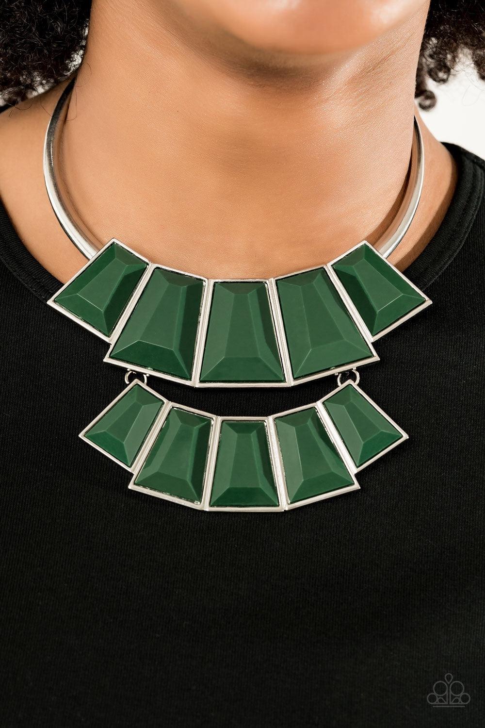 Paparazzi Accessories Lions, TIGRESS, and Bears - Green Tinted in the lush green hue of Eden, rows of faceted emerald-shaped beads link into colorful beaded plates. The uppermost frame slides along a bowing silver bar, adding playful movement to this fier