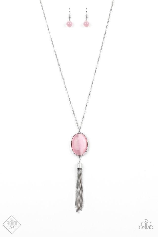Paparazzi Accessories Tasseled Tranquility - Pink An oversized pink cat's eye stone frame gives way to a shimmery silver chain tassel, creating a whimsically stacked pendant at the bottom of a lengthened silver chain. Features an adjustable clasp closure.