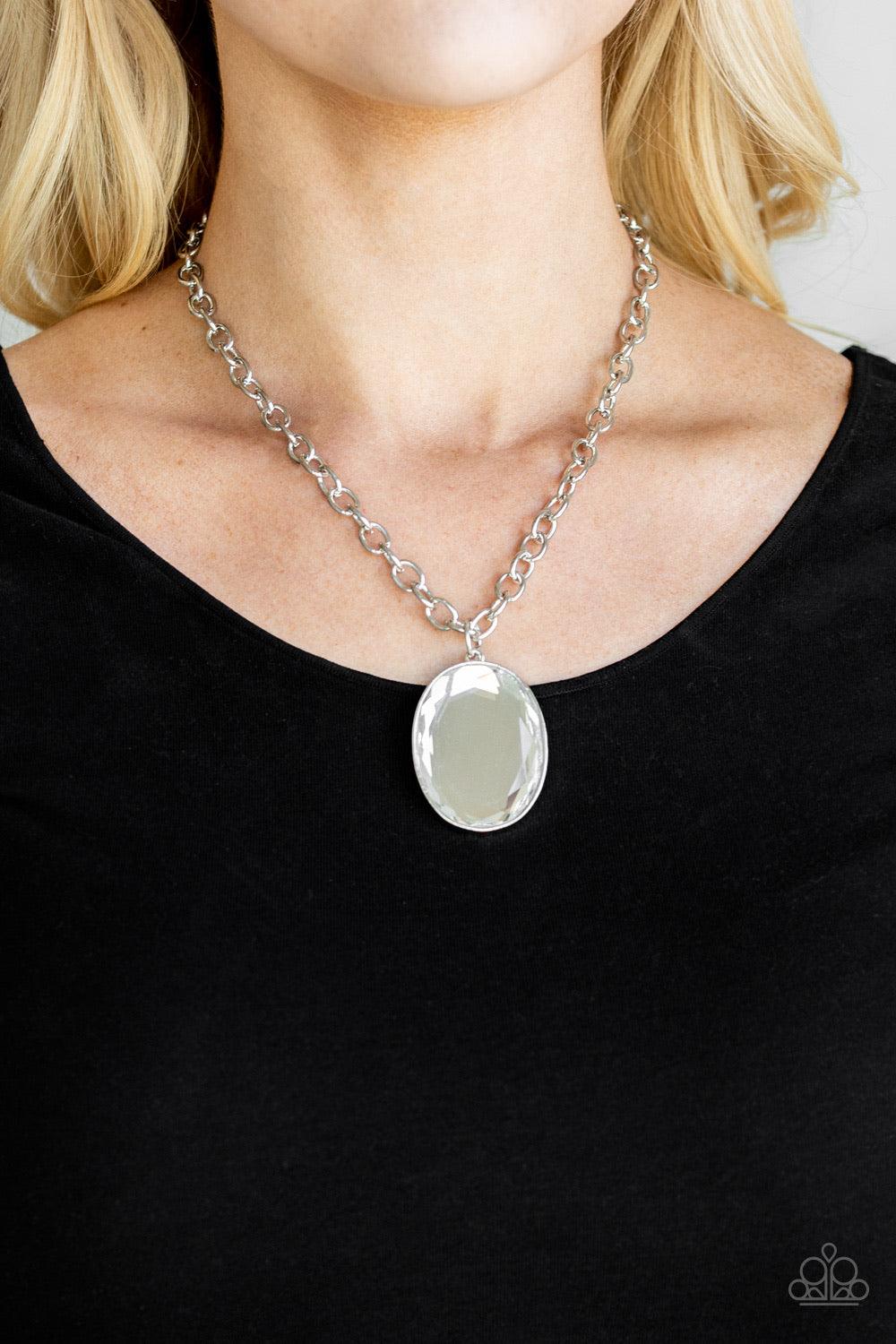 Paparazzi Accessories Light As HEIR - White Featuring a sleek silver frame, an oversized oval gem swings below the collar for a dramatically glamorous look. Features an adjustable clasp closure. Jewelry