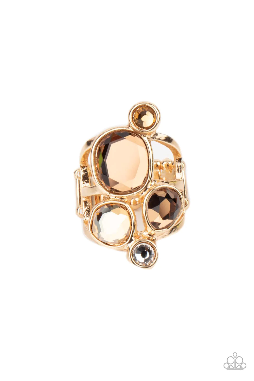 Paparazzi Accessories Demandingly Duchess - Brown A collection of sparkling champagne-colored gems in varying sizes, accented by a single white rhinestone, forms an asymmetrical cluster atop the finger. Set in sleek gold frames over airy gold bands, the b