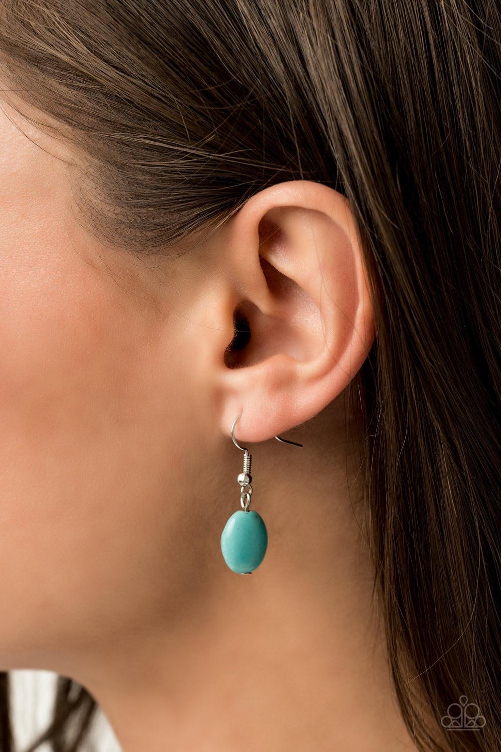 Paparazzi Accessories Prairie Goddess - Blue Chiseled into tranquil ovals, oversized turquoise stones are pressed into antiqued silver frames radiating with studded textures. The refreshing frames delicately link below the collar for a statement-making fi