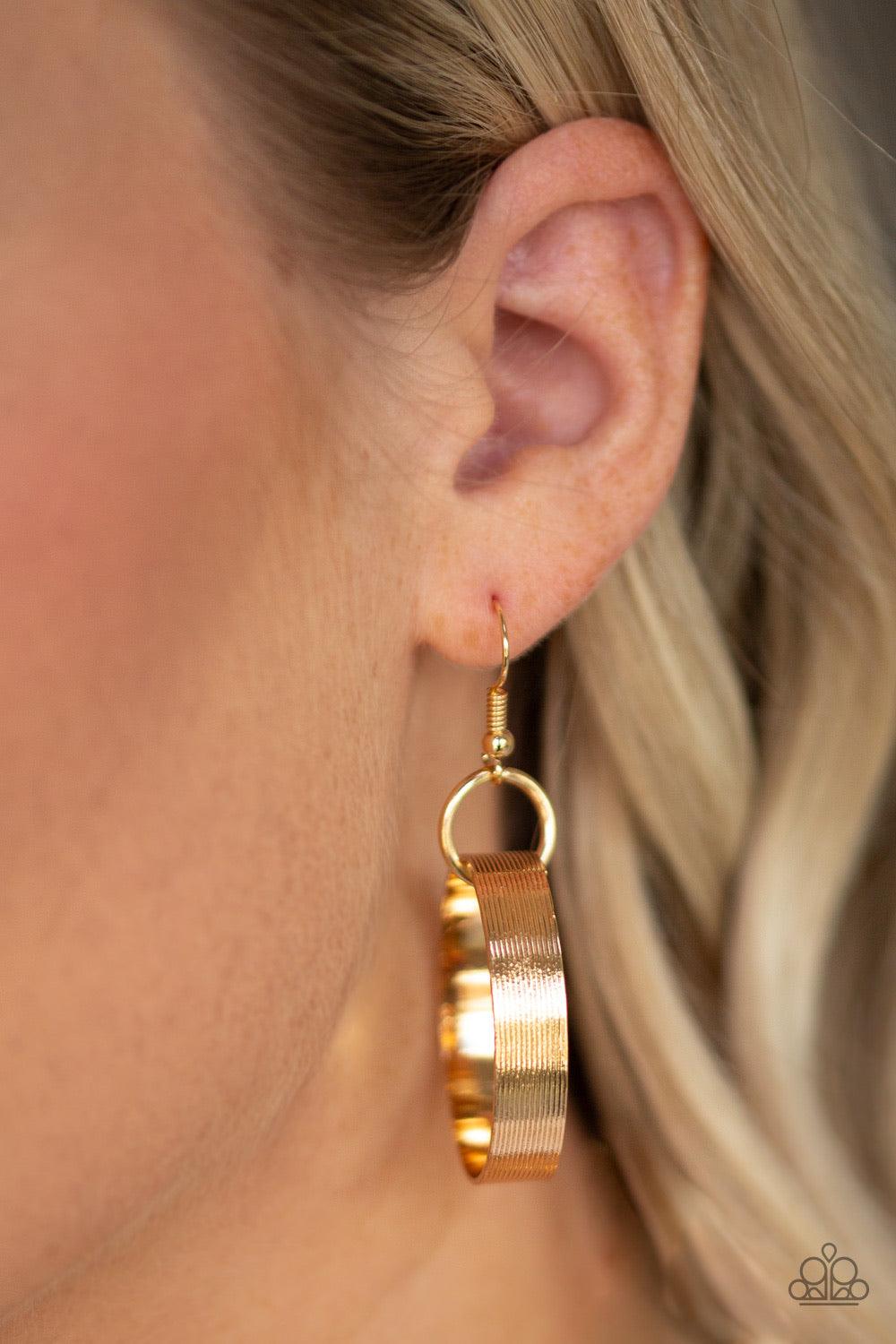 Paparazzi Accessories Big Hit - Gold Etched in linear patterns, dramatically oversized gold links connect below the collar for a bold statement-making look. Features an adjustable clasp closure. Jewelry