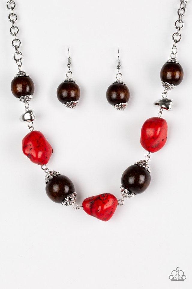 Paparazzi Accessories Earth Goddess - Red Infused with ornate silver accents, red stones and round wooden beads trickle along a shimmering silver chain, creating an artisanal statement piece that falls just below the collar. Features an adjustable clasp c