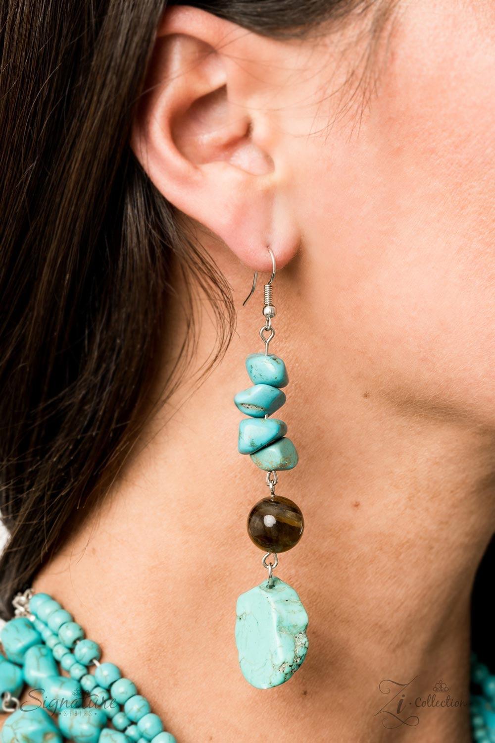Paparazzi Accessories The Monica 💗ZiCollection $25💗 Joined together by silver fittings, strand after strand of turquoise stones and tiger's eye accents layer down the chest in this groundbreaking look. Featuring round, raw, and pebble-like finishes, the
