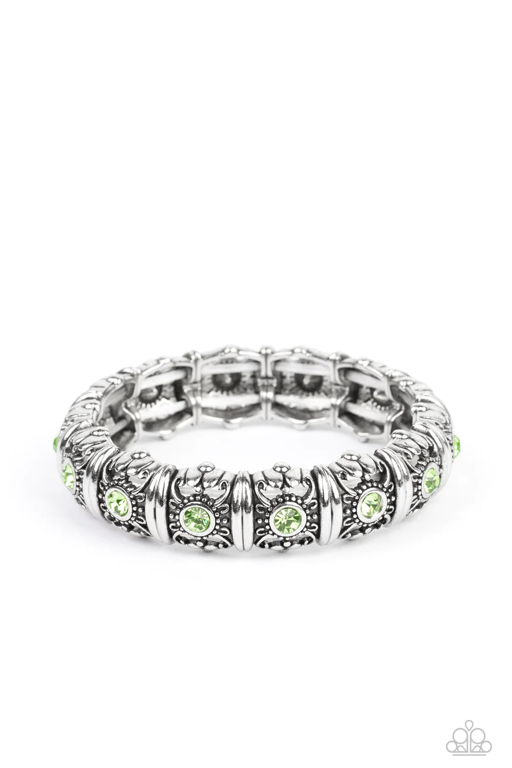 Paparazzi Accessories Ageless Glow - Green Centered around silver intricate, floral casings, green rhinestones glimmer on threaded stretchy bands around the wrist for an ageless look. Sold as one individual bracelet. Jewelry