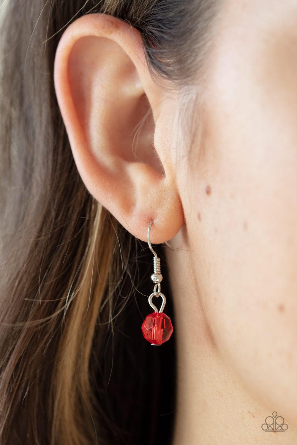 Paparazzi Accessories Very Voluminous ~Red Infused with dainty silver accents, exaggerated display of oversized silver beads, faceted red crystal-like beads, and cloudy red beads are threaded along an invisible wire below the collar for a colorfully state
