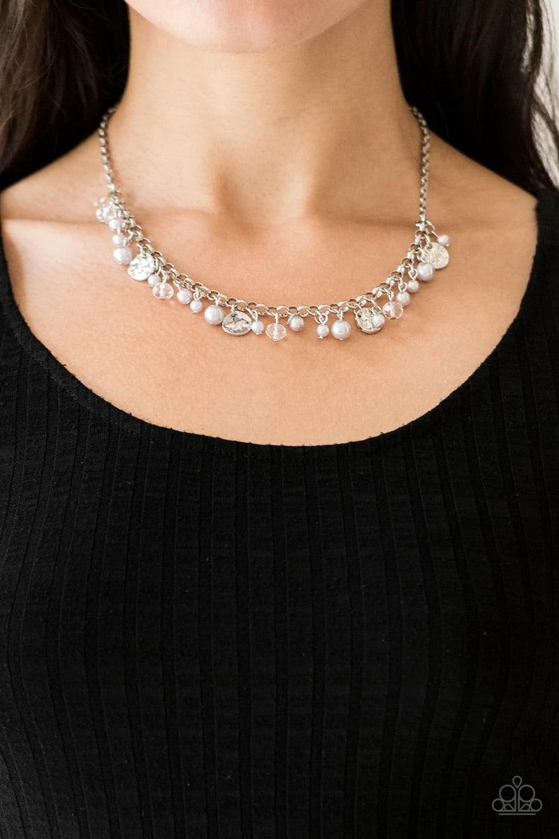 Paparazzi Accessories Coastal Cache - Silver Pearly silver beads, smoky crystal-like gems, and hammered silver discs swing from a bold silver chain, creating a refined fringe below the collar. Features an adjustable clasp closure. Sold as one individual n