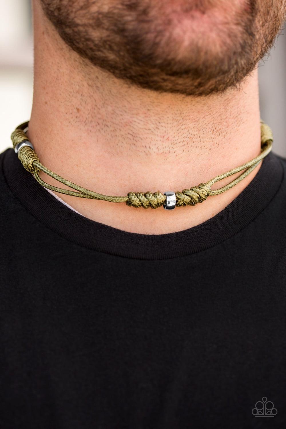 Paparazzi Accessories Great Basin - Green Shiny green cording knots around shimmery silver accents, creating a rugged look below the collar. Features a button loop closure. Jewelry