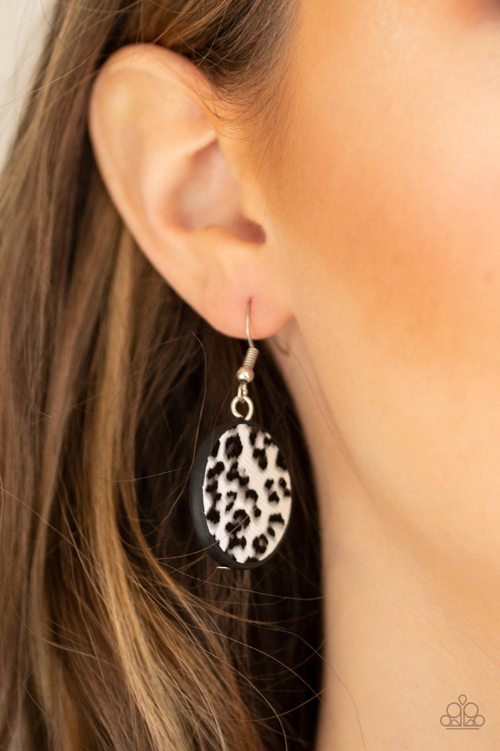 Paparazzi Accessories Here Kitty Kitty - White Featuring textured white and gray cheetah print, a wild collection of circle and square leather pieces are threaded along an invisible wire below the collar for a fierce look. Features an adjustable clasp clo