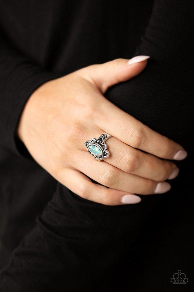 Paparazzi Accessories Glass Half-COLORFUL - Green An opalescent green gem is pressed into a scalloped silver frame radiating with shiny silver studs, creating a whimsical frame atop the finger. Features a dainty stretchy band for a flexible fit. Sold as o