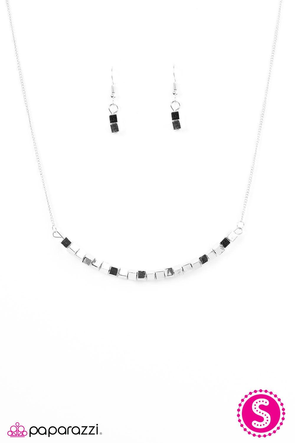 Paparazzi Accessories BoomBox Baby - Silver Glistening cube beading is threaded along a silver wire, creating a versatile pendant below the collar. Infused with a matching silver chain, the edgy cube beading coalesces into a gorgeous tone on tone palette.