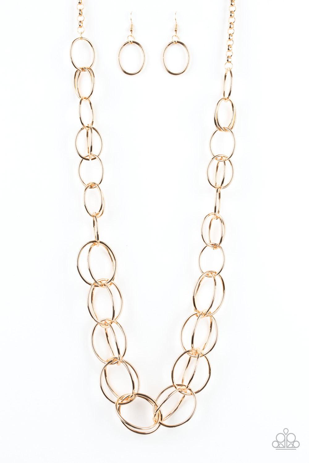 Paparazzi Accessories Elegantly Ensnared - Gold Gradually increasing in size, a collection of bold gold hoops link to a dramatically interconnected chain for a statement-making look. Features an adjustable clasp closure. Jewelry