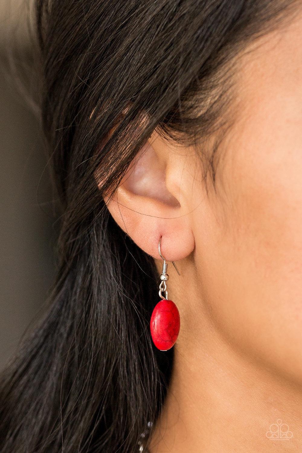Paparazzi Accessories Leave Your LANDMARK - Red Radiating with studded and tribal inspired patterns, antiqued silver plates connect below the collar for a fierce look. Fiery red stones are pressed into the plates, adding an artisan flair to the dramatic c