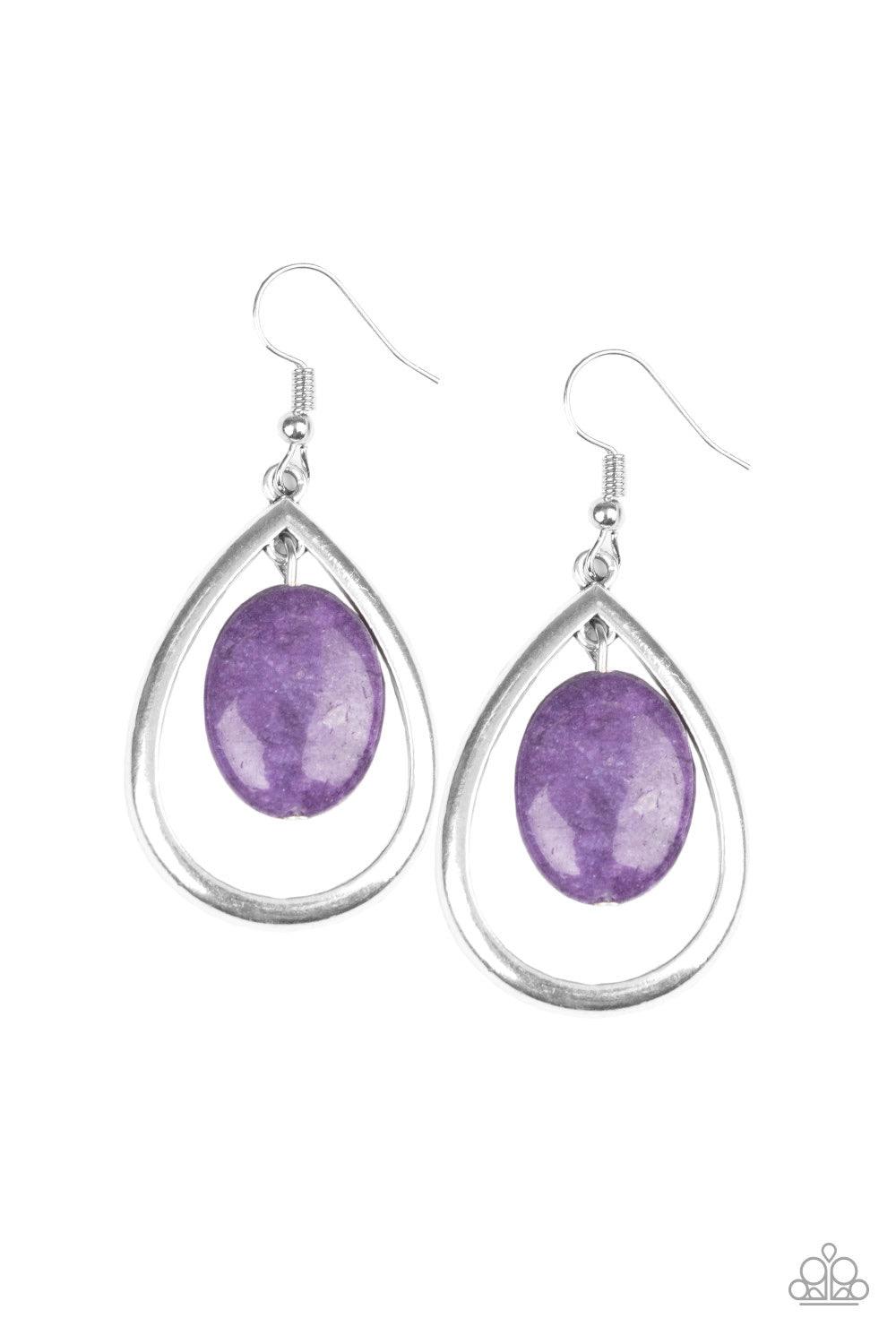 Paparazzi Accessories Seasonal Simplicity - Purple An oval purple stone swings from the bottom of an antiqued silver teardrop frame, creating a seasonal lure. Earring attaches to a standard fishhook fitting. As the stone elements in this piece are natural