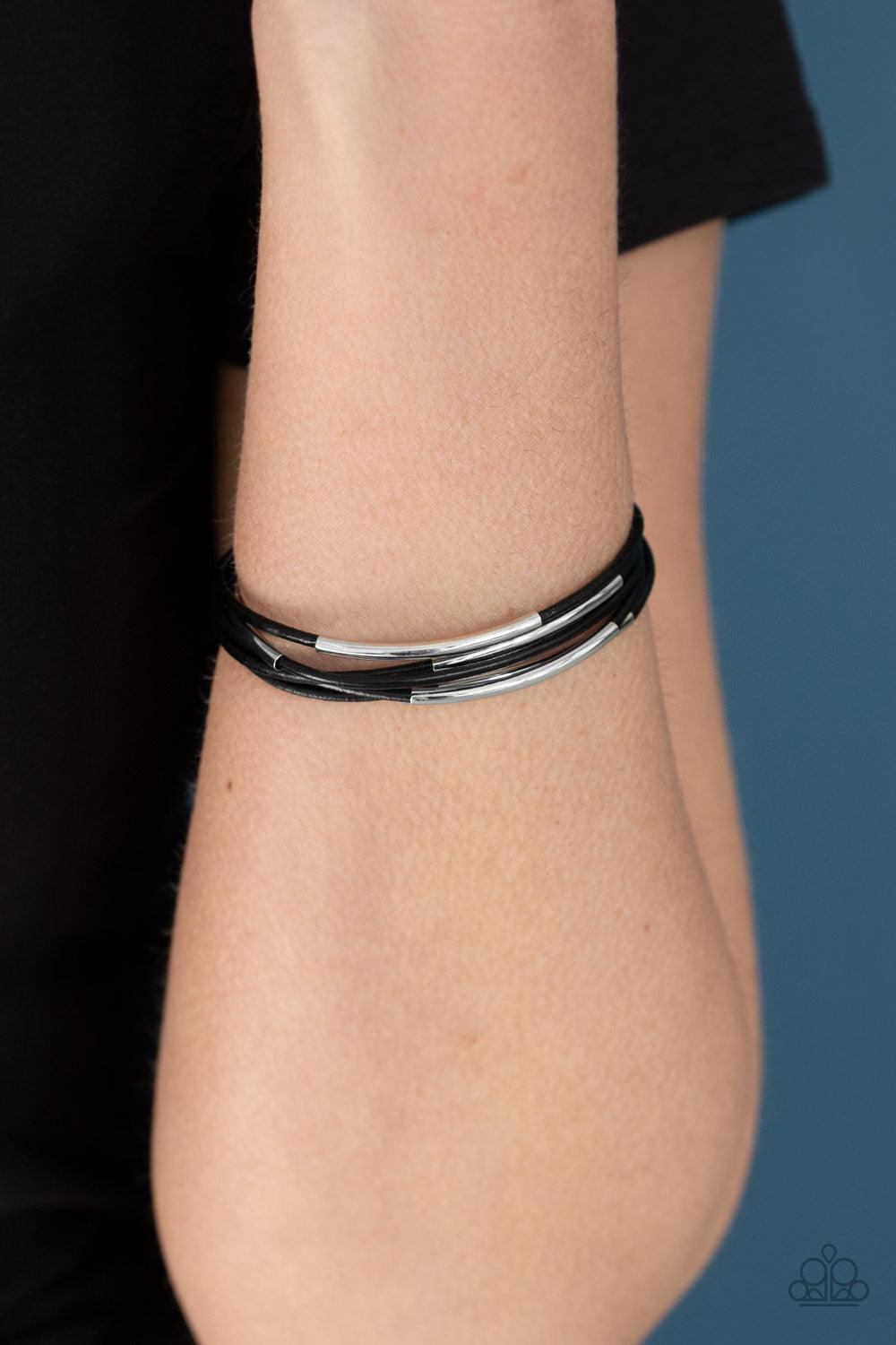 Paparazzi Accessories Power CORD - Black Cylindrical silver beads slide along shiny black cords, creating edgy layers across the wrist. Features a magnetic closure. Sold as one individual bracelet. Jewelry