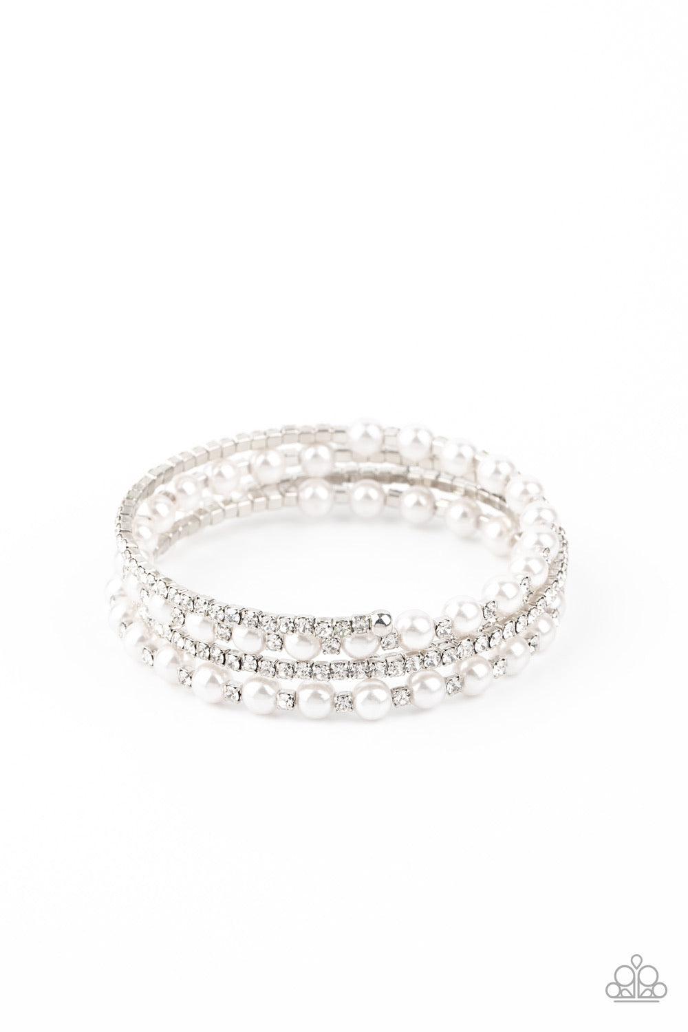 Paparazzi Accessories Starry Strut - White Row after row of glassy white rhinestones and classic white pearls coil around the wrist, creating a blinding infinity wrap bracelet. Sold as one individual bracelet. Jewelry