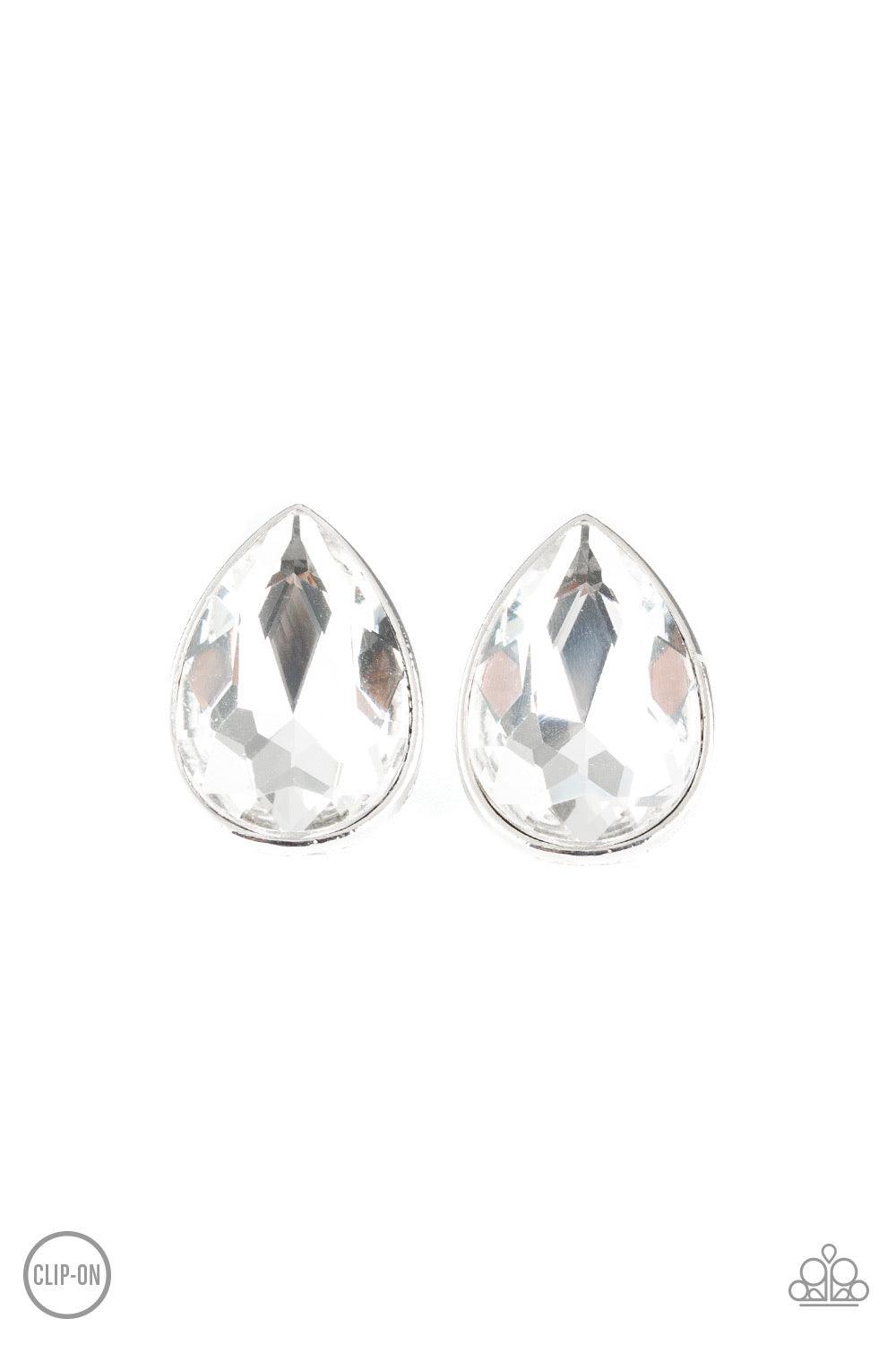 Paparazzi Accessories Dance On HEIR - White *Clip-On A dramatically oversized white teardrop rhinestone is pressed into a sleek silver frame for a show-stopping glam. Earring attaches to a standard clip-on fitting. Jewelry