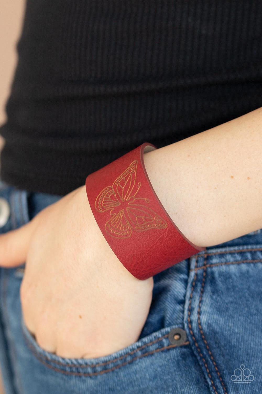 Paparazzi Accessories Flirty Flutter - Red Stamped in a whimsical butterfly, a rustic piece of red leather wraps around the wrist for a seasonal flair. Features an adjustable snap closure. Sold as one individual bracelet. Jewelry