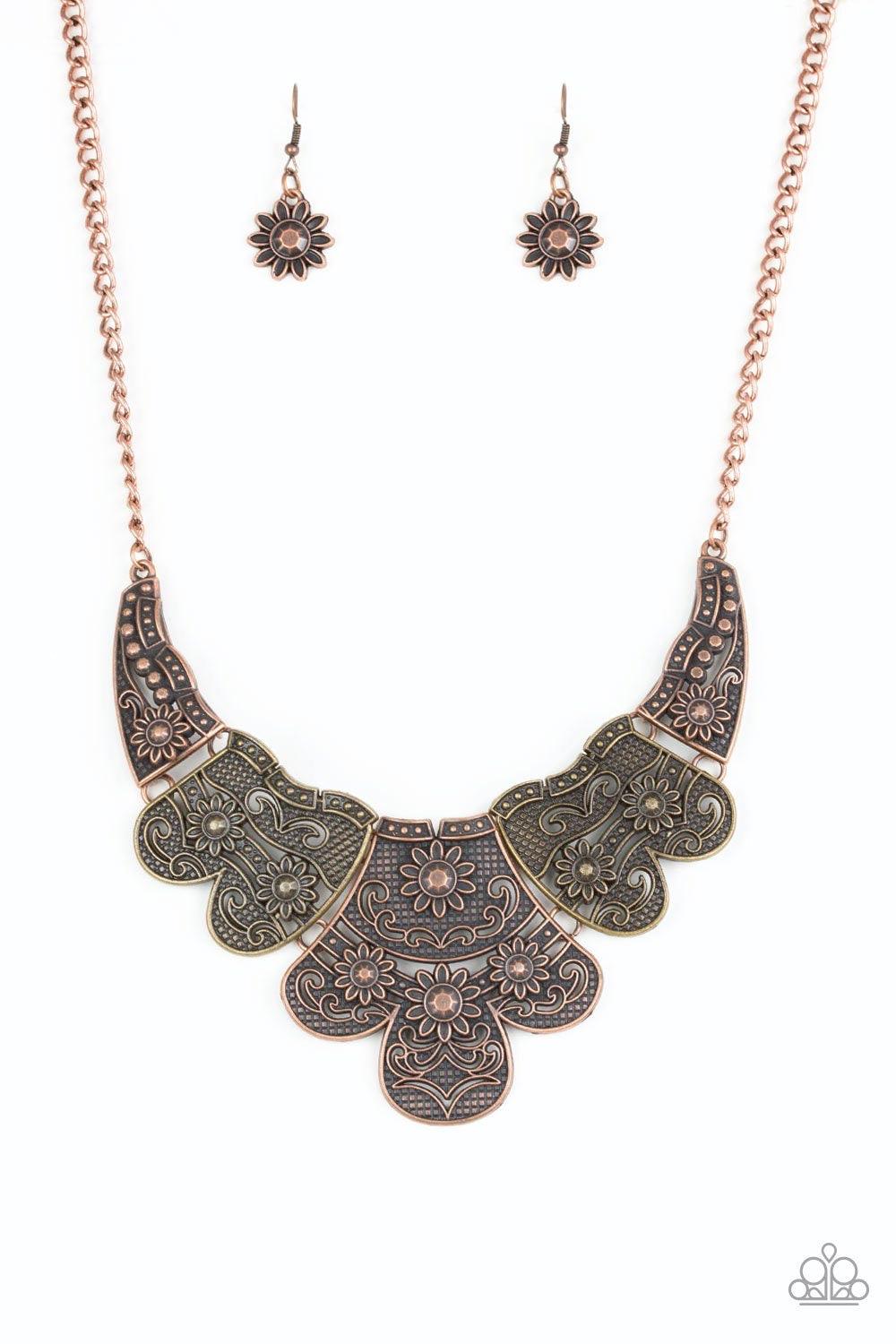 Paparazzi Accessories Mess With The Bull - Multi Embossed in whimsical floral detail, antiqued brass and copper plates connect below the collar for a statement making look. Features an adjustable clasp closure. Sold as one individual necklace. Includes on