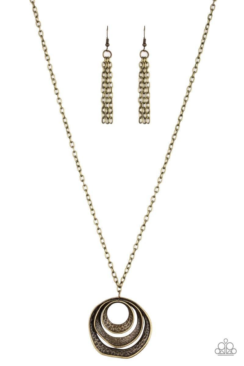Paparazzi Accessories Breaking Pattern - Brass Hammered in an array of mismatched textures, three asymmetrical hoops join into an abstract pendant at the bottom of a lengthened brass chain for a handcrafted look. Features an adjustable clasp closure. Sold