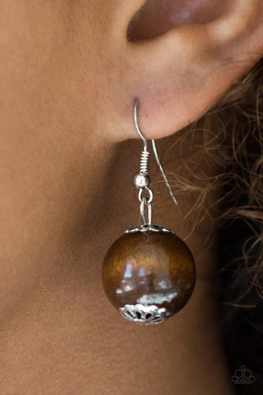 Paparazzi Accessories Effortlessly Everglades - Brown Gradually increasing in size near the center, earthy wooden beads are threaded along a brown string for a summery look. Features an adjustable sliding knot closure. Jewelry