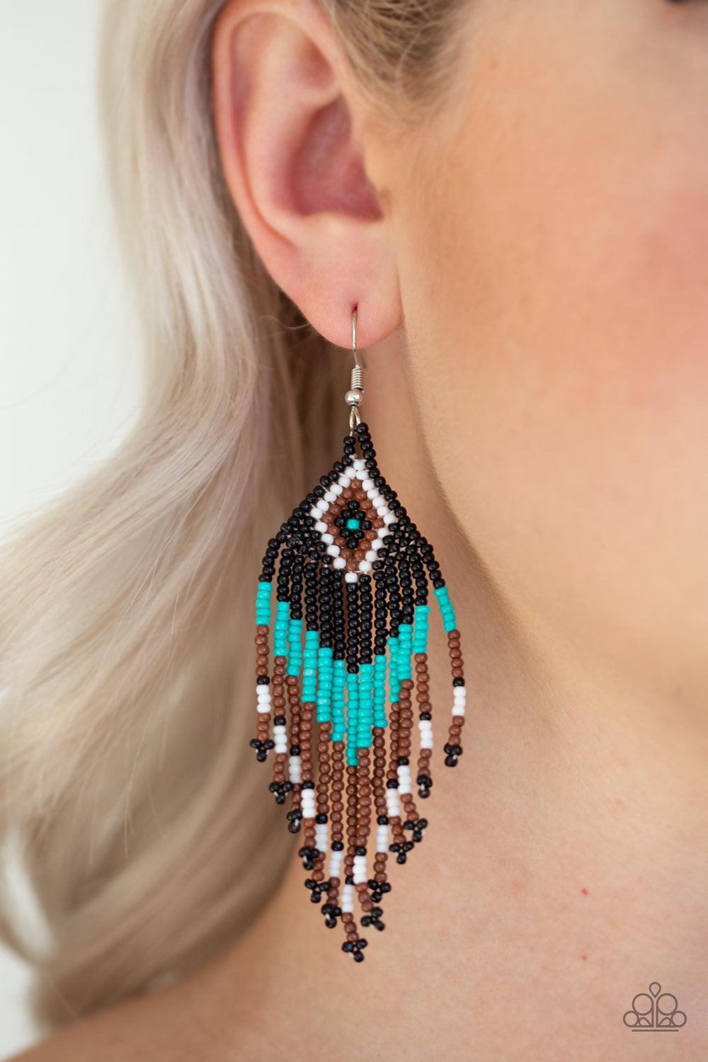 Paparazzi Accessories Wind Blown Wanderer - Blue Joined together with metallic fittings, countless red seed beads are threaded along stretchy elastic bands. Sections of dainty silver beads are sprinkled along the colorful layers, adding hints of shimmer t