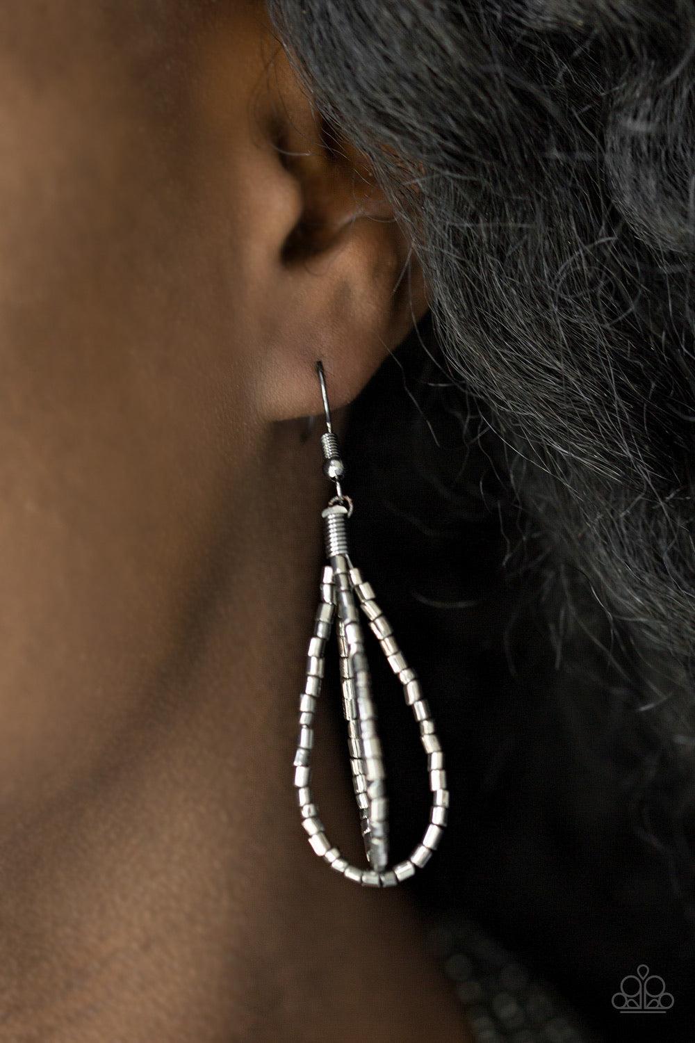 Paparazzi Accessories Flashy Fashion - Black Brushed in a flashy finish, countless strands of black seed beads converge with strands of gunmetal seed beads, creating colorful layers below the collar. Features an adjustable clasp closure. Sold as one indiv