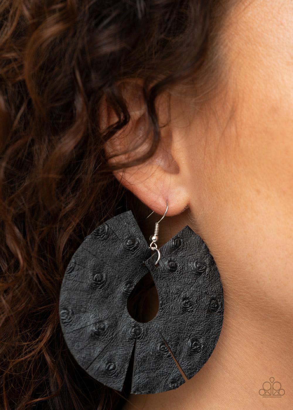 Paparazzi Accessories Palm Islands - Black Dotted in distressed textures, a black leather teardrop is spliced into a trendy fringe-like pattern. Earring attaches to a standard fishhook fitting. Sold as one pair of earrings. Jewelry