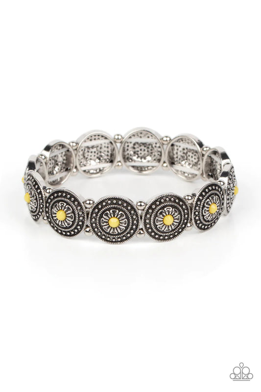 Paparazzi Accessories Granada Garden Party - Yellow Dotted with faceted Illuminating beaded centers, a studded collection of floral silver frames alternate with dainty silver beads along stretchy bands around the wrist for a whimsical pop of color. Sold a