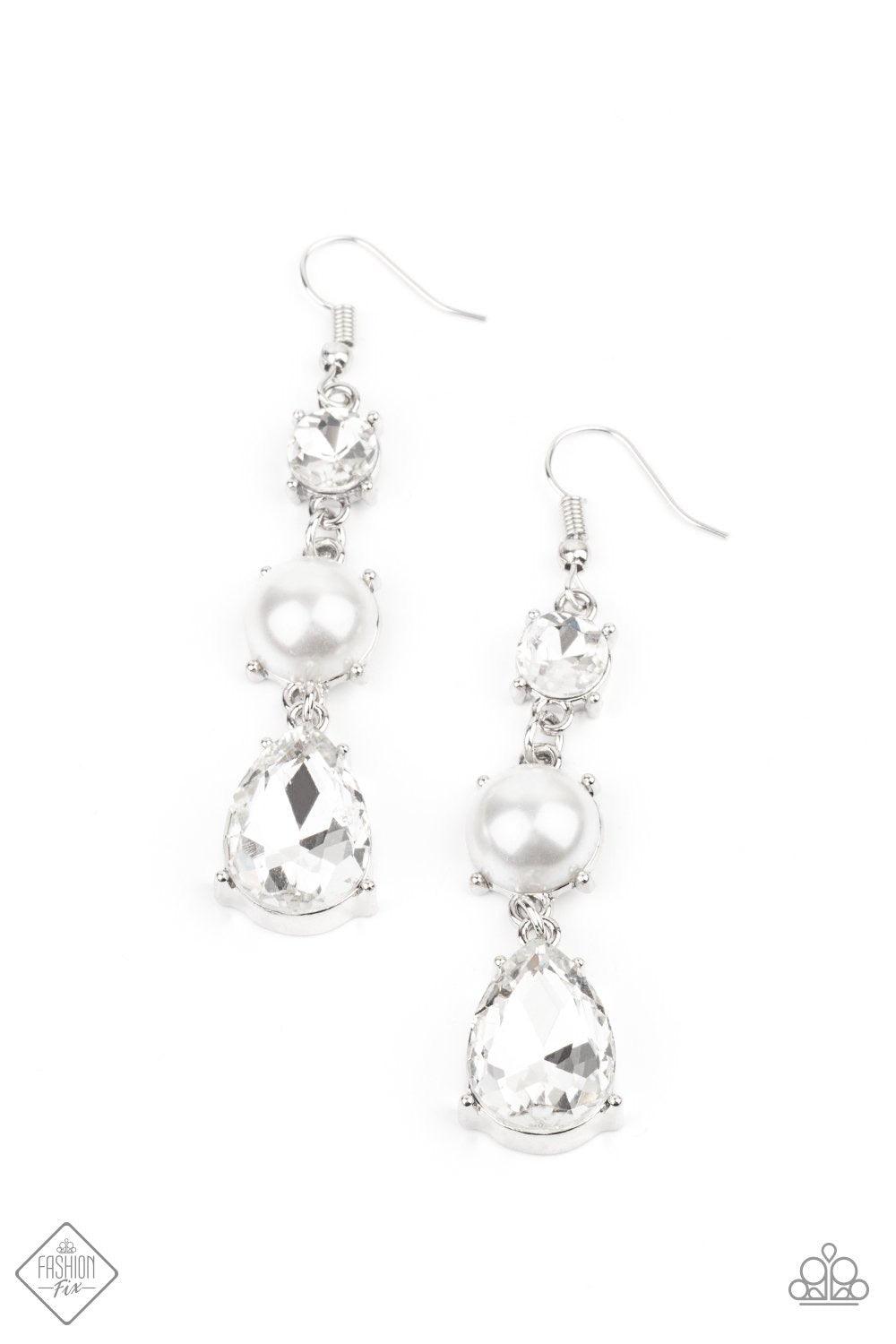 Paparazzi Accessories Unpredictable Shimmer ~White An oversized white teardrop gem swings from the bottom of a stacked pearly white bead and classic white rhinestone, creating a timeless lure. Earring attaches to a standard fishhook fitting. Sold as one p