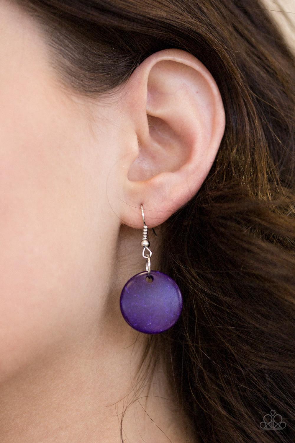 Paparazzi Accessories Bermuda Belle - Purple Brushed in a vivacious purple finish, wooden rings and beads are knotted in place along three strands, creating summery layers down the chest. Features a button loop closure. Jewelry