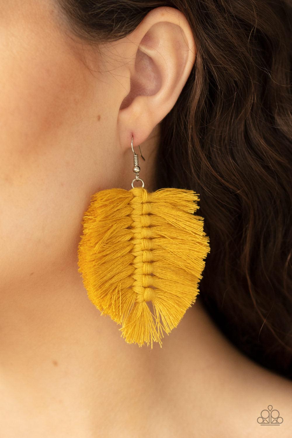 Paparazzi Accessories Knotted Native - Yellow Saffron tassels knot together, coalescing into a bold fringe for a dramatic look. Earring attaches to a standard fishhook fitting. Jewelry