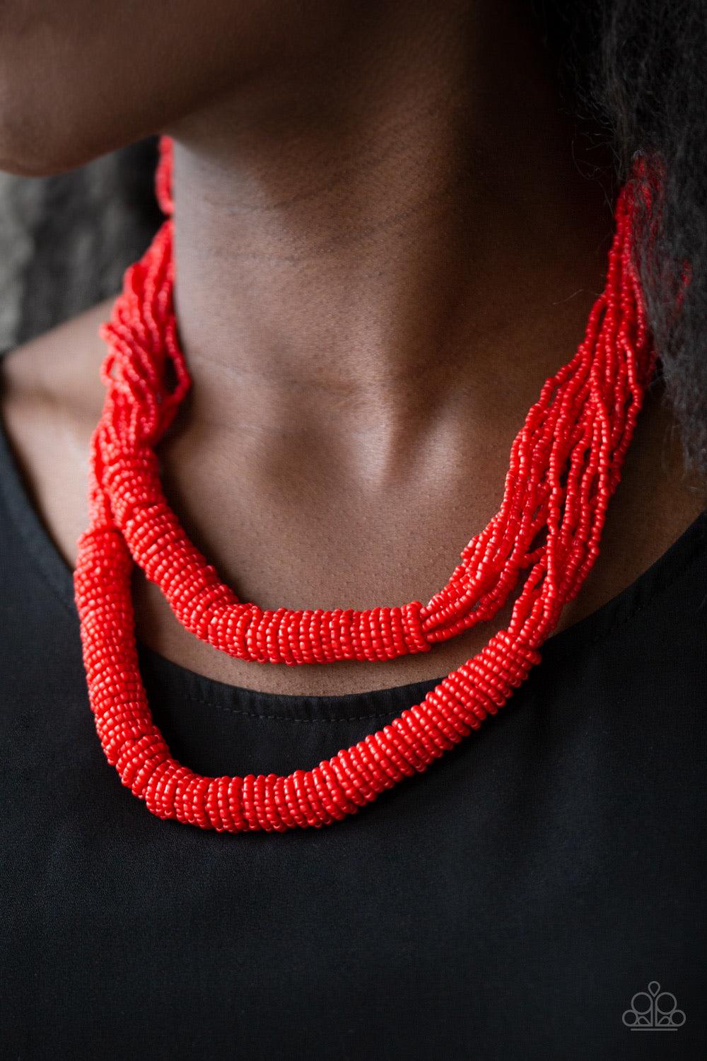 Paparazzi Accessories Right As RAINFOREST ~Red Countless layers of fiery red seed beads drape below the collar. Additional strands of red seed beads wrap around the center of the layers, creating two bulky rows for a seasonal flair. Features an adjustable
