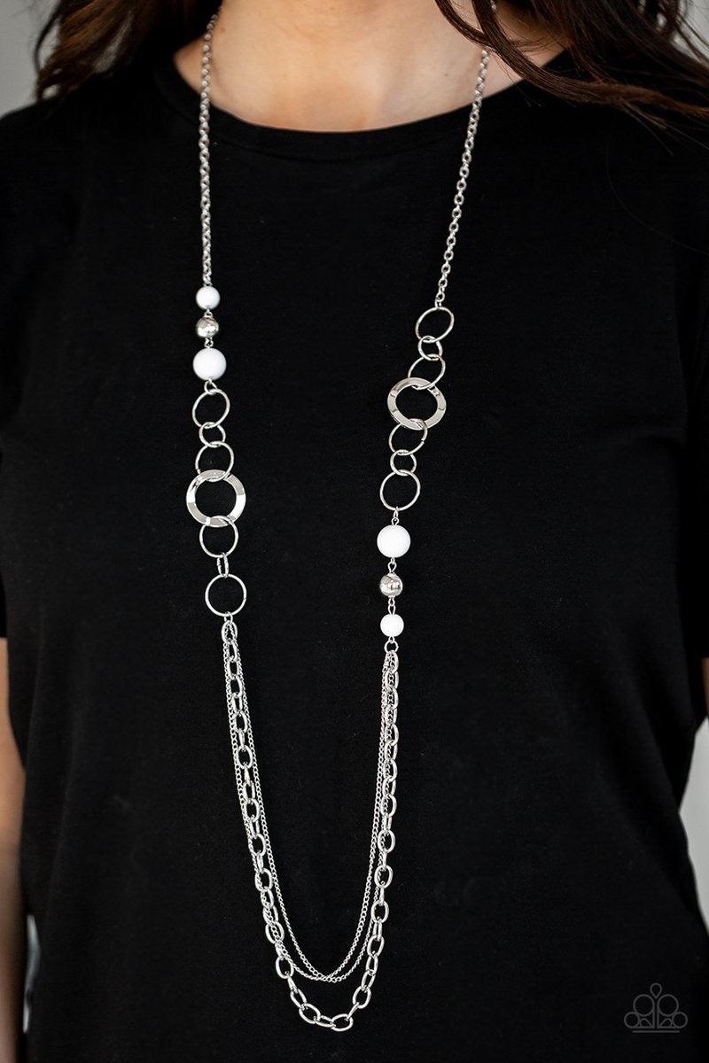 Paparazzi Accessories Modern Motley - White Refreshing white beads, shiny silver beads, and glistening silver hoops give way to mismatched silver chains for a whimsical look. Features an adjustable clasp closure. Sold as one individual necklace. Includes
