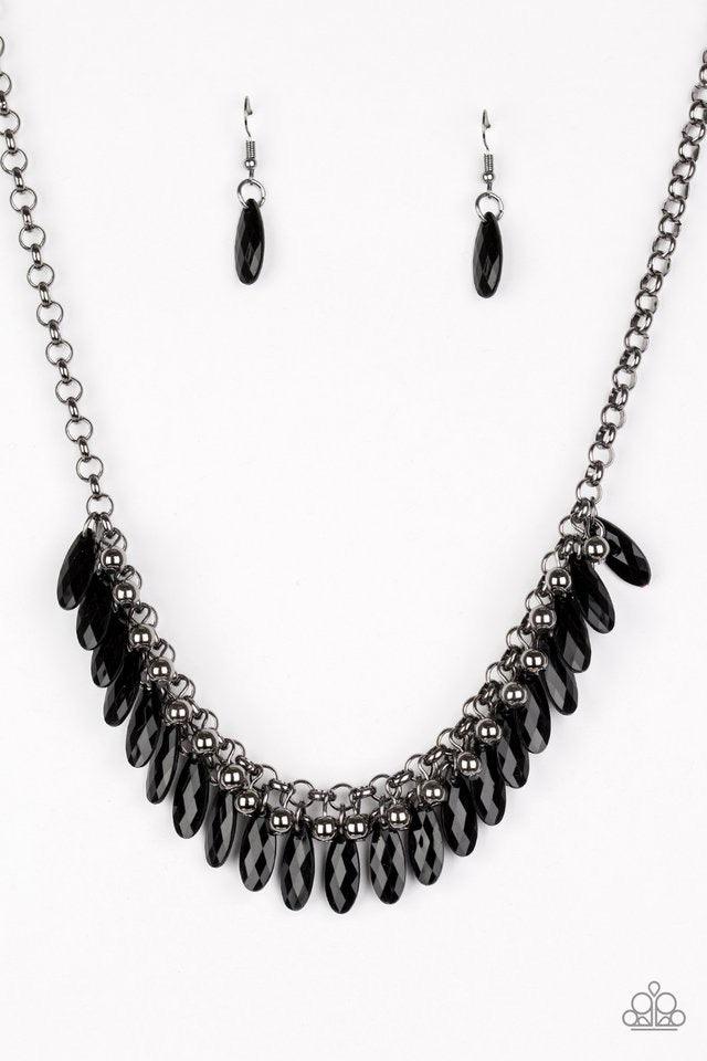 Paparazzi Accessories Jersey Shore - Black Faceted black teardrops and glistening gunmetal beads swing from the bottom of interlocking gunmetal chains, creating a spunky fringe below the collar. Features an adjustable clasp closure. Sold as one individual