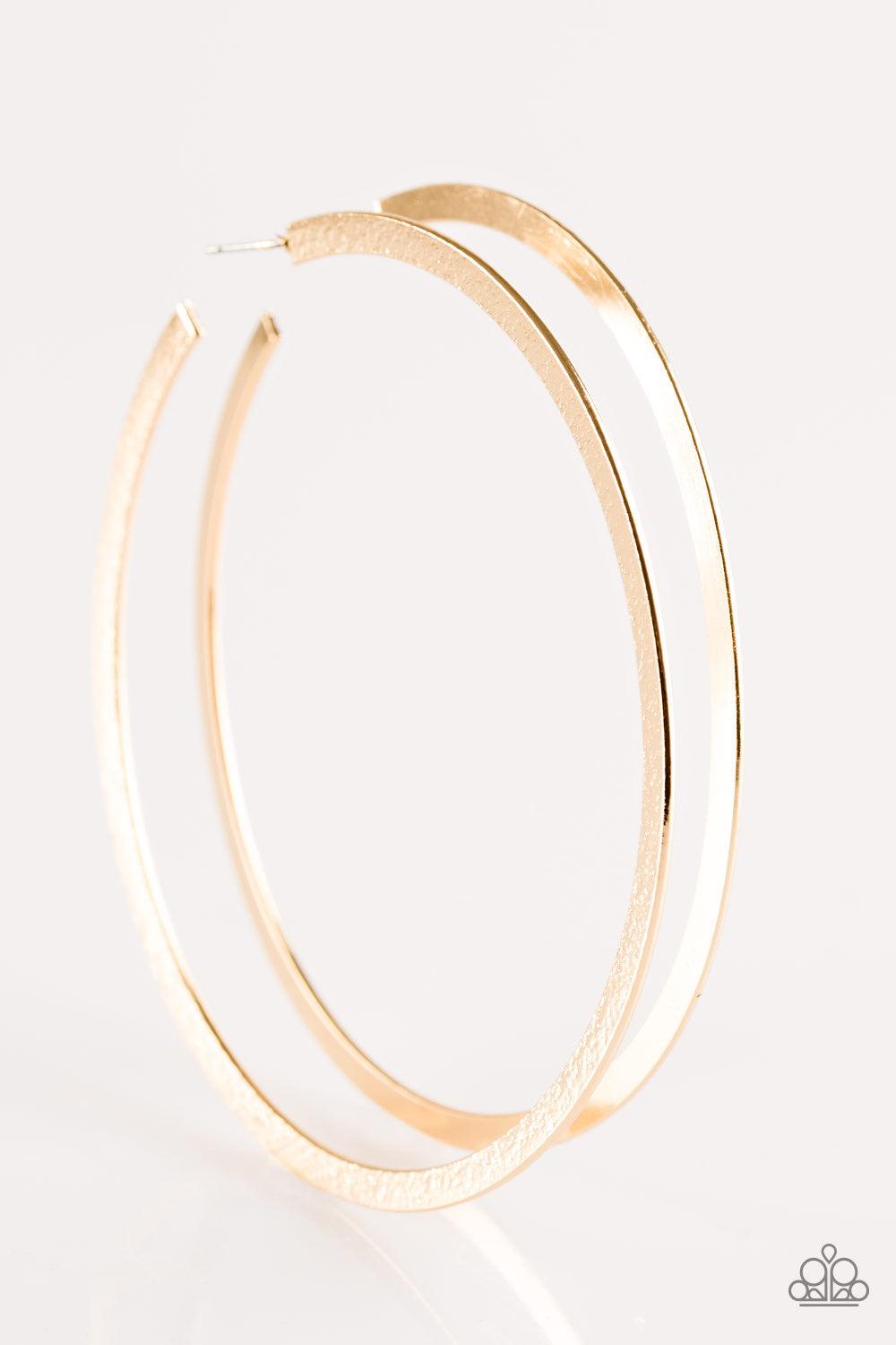 Paparazzi Accessories Size Them Up - Gold One side of a gold hoop is delicately hammered, adding blinding shimmer to the dramatic palette. Hoop measures 3 1/2” in diameter. Earring attaches to a standard post fitting. Jewelry