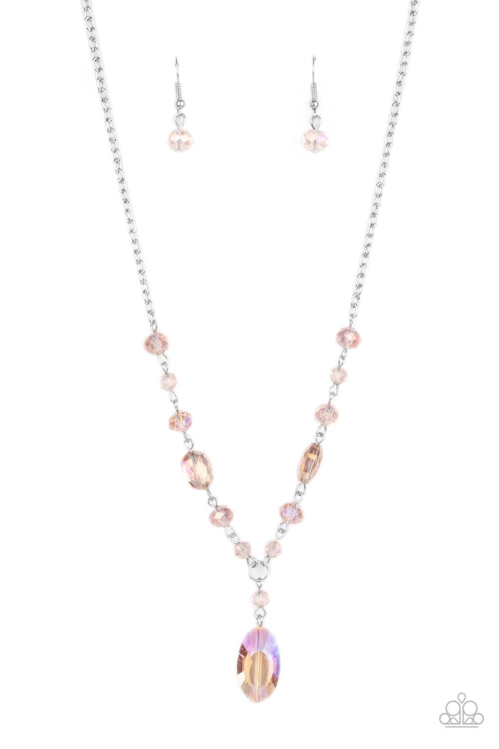 Paparazzi Accessories Fashionista Week - Pink Featuring an iridescent shimmer, an oval pink crystal-like bead swings from the bottom of a matching crystal-beaded chain, creating an elegantly extended pendant below the collar. Features an adjustable clasp
