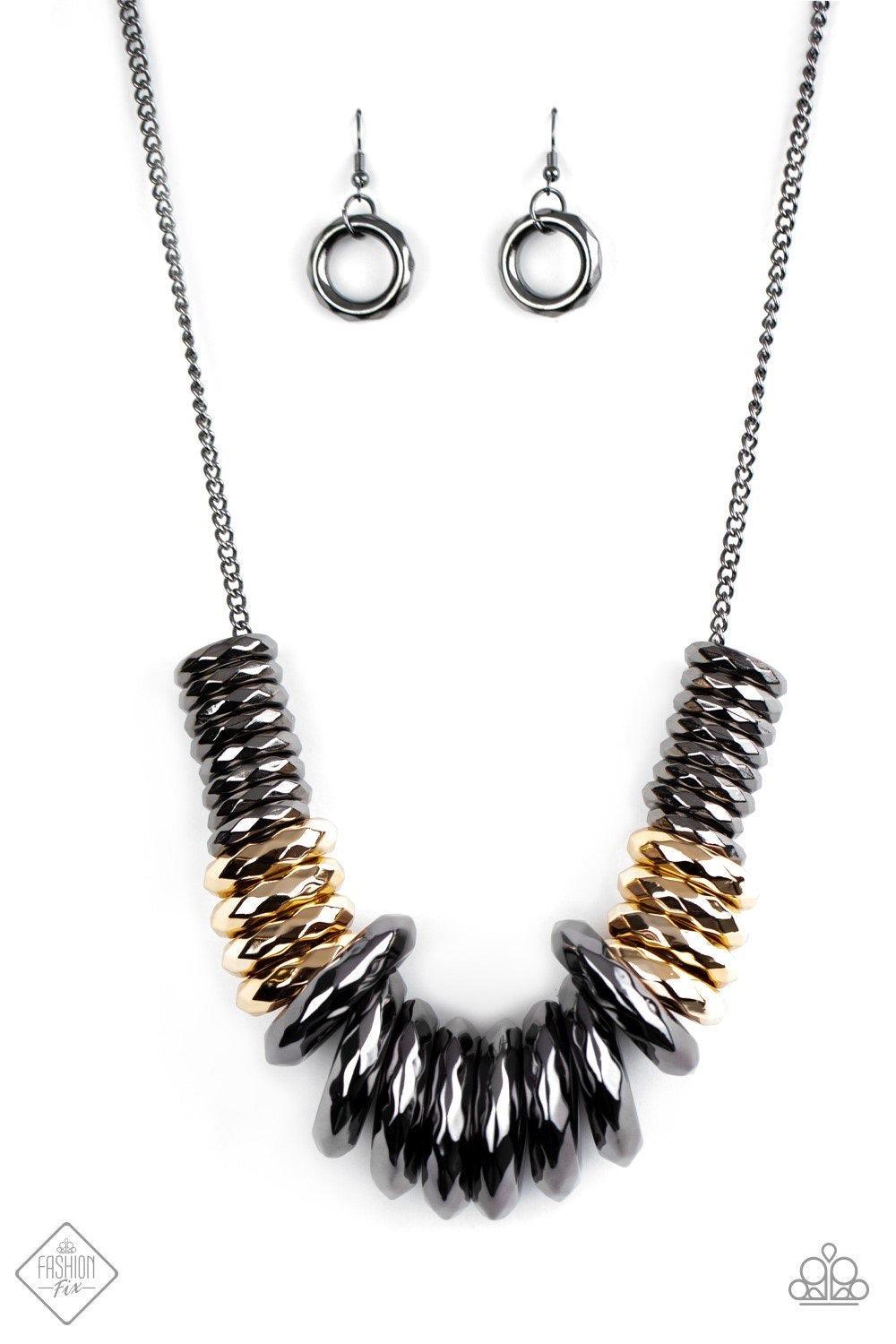 Paparazzi Accessories Haute Hardware - Multi Gradually increasing in size, a collision of faceted gunmetal and gold rings slides along a classic gunmetal chain below the collar, creating a bold industrial statement piece. Features an adjustable clasp clos