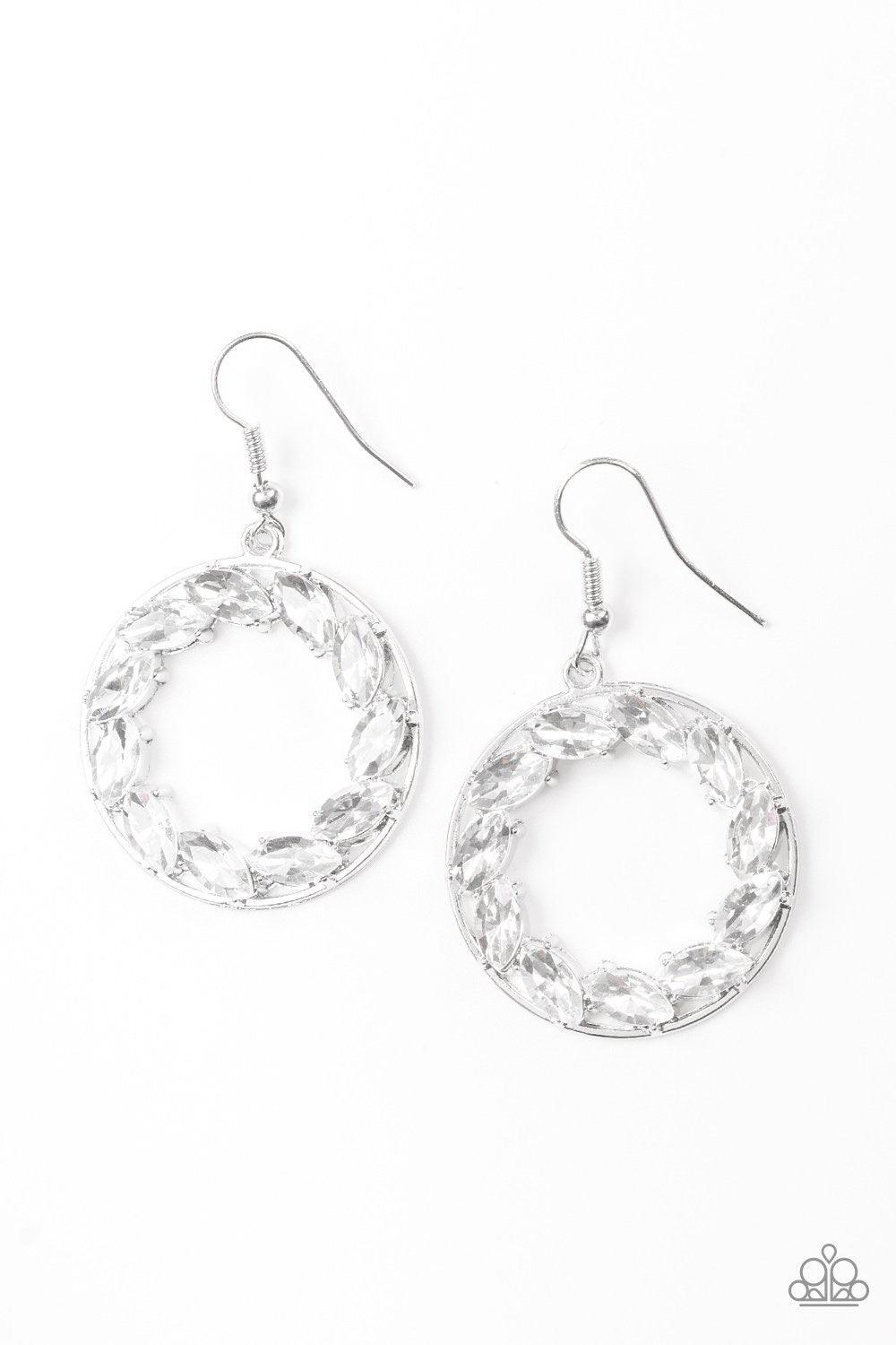Paparazzi Accessories Global Glow - White Featuring regal marquise style cuts, glittery white rhinestones are encrusted along a shimmery silver hoop for a radiant fashion. Earring attaches to a standard fishhook fitting. Sold as one pair of earrings. Jewe