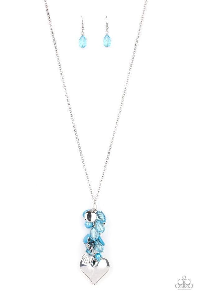 Paparazzi Accessories Beach Buzz - Blue Infused with an array of blue beads, a collection of antiqued silver shell and butterfly charms trickle along the bottom of a shimmery silver chain. Complemented with glittery white rhinestone encrusted beads, a dra