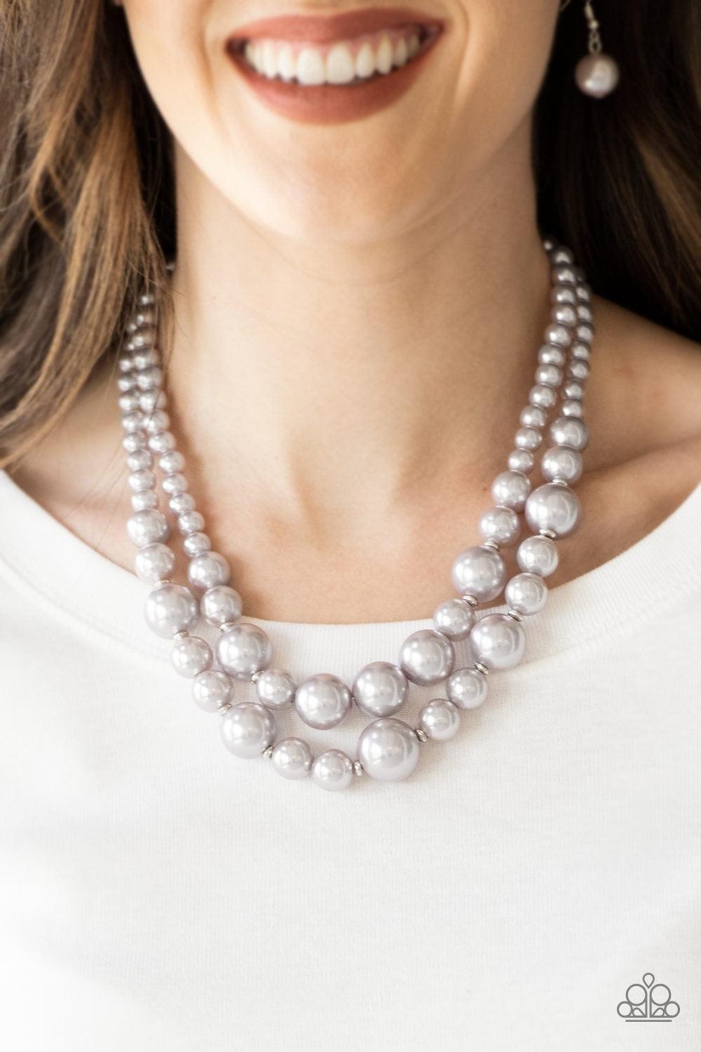 Paparazzi Accessories The More The Modest - Silver Infused with dainty silver accents, classic silver pearls layer below the collar in a timeless fashion. Features an adjustable clasp closure. Jewelry