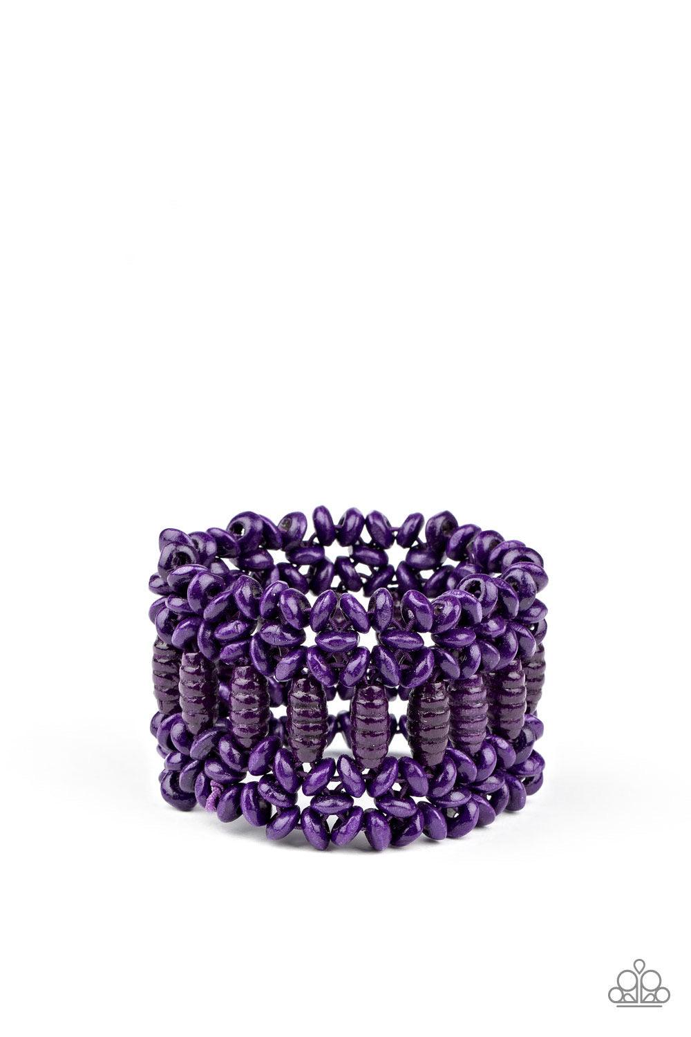 Paparazzi Accessories Fiji Flavor - Purple Painted in a vivacious purple finish, round and oval wooden beads are threaded along stretchy bands that weave into a colorful floral patterned stretch bracelet around the wrist. Sold as one individual bracelet.